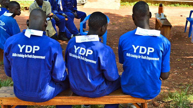 YDP students at GDPU waiting for their examiner in 2015. The labels show their name and exam number.